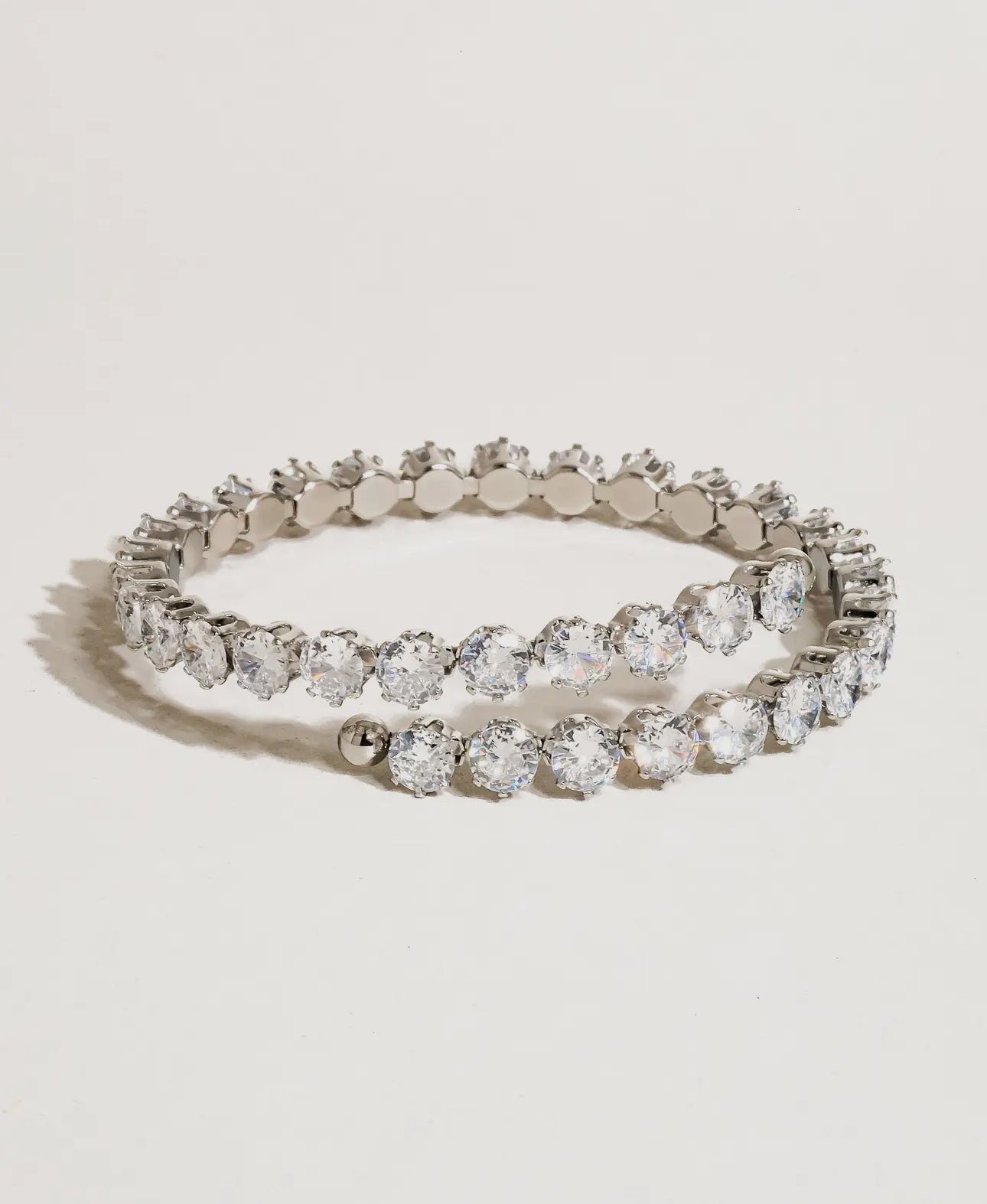 18k clam tennis bracelet