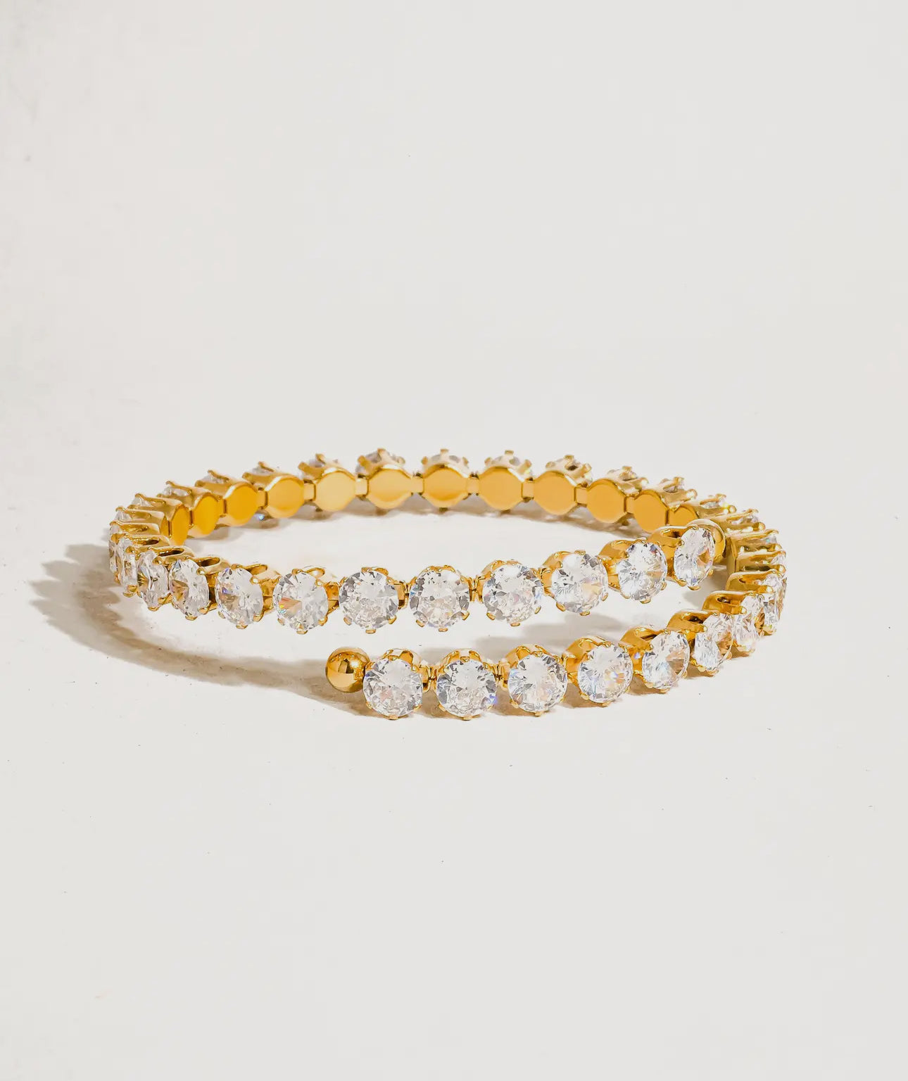 18k clam tennis bracelet