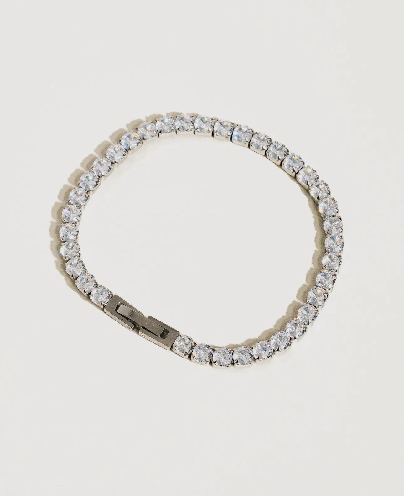 Tennis bracelet 18 k over sterling