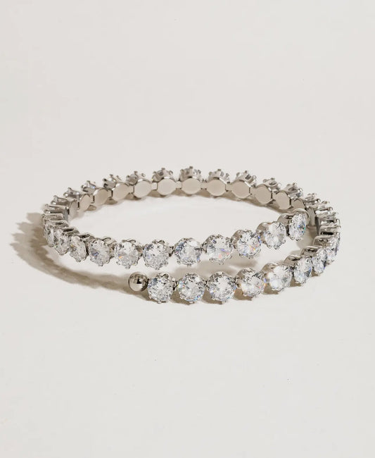 18k clam tennis bracelet