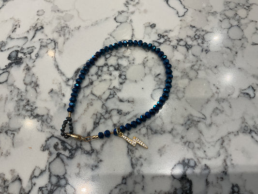 Lightning charm with blue